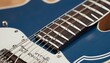 Zoom in on the headstock of a blue and white elect upscaled_2