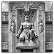 Art Deco AI sculpture of male on a building facade