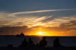 Tourists, in silhouette, are seen at Ponta de Humaita enjoying the sunset in the city of Salvador, Bahia.