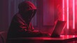 Hacker Silhouette with Laptop in Red Neon Cybersecurity Concept