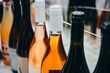Different bottles of wine ready for wine tasting in a bar or restaurant or wine expo.