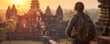 Before Angkor Wat, a backpacker stands alone, enveloped in the serene, golden light of sunrise.
