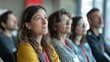 © Suryani - Focused audience attentively listening at a conference, engaging with educational content - Concept of professional development, adult education, and knowledge sharing