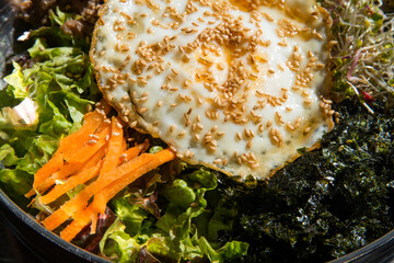 Wall Mural - View of the bibimbap, a traditional Korean food