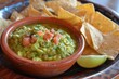 Mexican dip with guacamole salsa and tortilla chips