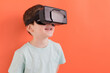 Child in virtual reality headset glasses