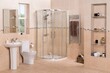 Modern bathroom interior with shower cabin pedestal sink toilet