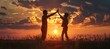 Father-Son Celebration: Silhouette of a Happy Father High-Fiving His Son

