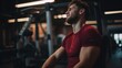 A Caucasian gym-goer holds his aching shoulder. Man with excruciating arm injuries from shattered joint and workout muscle inflammation. Stiff bodily cramps producing pain and strain