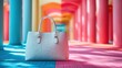 © dalane - White women's leather bag on a multicolored background.