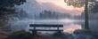 Serene mountain lake at sunrise with fog and bench in foreground