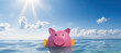 Tranquil scene: a pink piggy bank peacefully floats atop calm ocean waters against a backdrop of clear skies.