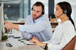 © peopleimages.com - Call center, training or business people on computer in office for telemarketing, faq or customer service. About us, coaching or manager with inbound marketing consultant for b2b, crm or networking