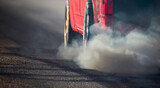 Fototapeta  - Air pollution from diesel vehicle exhaust pipe on road