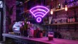 A neon purple wifi icon displayed prominently at a tech cafe, indicating available internet connection with a stylish and contemporary flair