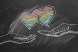 Fototapeta  - Male and female palms with rainbow hearts. LGBT, LGBTQIA rights and gender equality concept. Pride month. Declaration of love, acceptance of feelings, giving love.