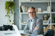 © Светлана Парникова - A male psychologist in the office sits at the table