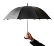 Hand holding a black umbrella isolated on transparent background. Generative AI