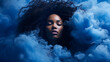 African american woman with her eyes closed stands enveloped in a deep sapphire cloud of smoke. Wallpaper.