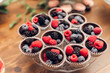 Berry Fruit Filled Chocolate Cups on Glass Dessert Tray for Wedding