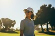 woman golfer playing golf by the course