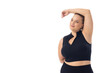 Caucasian young female plus size model on white background poses confidently, copy space