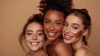© liliyabatyrova - Three women with different skin tones are smiling and posing for a photo
