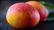 A ripe mango, with its golden-yellow skin tinged with red blushes, promises a sweet and succulent treat.