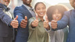 © peopleimages.com - Business people, hands and teamwork with thumbs up in city for agreement, unity or approval. Support or group of happy employees with like emoji, yes sign or ok for thank you, good job or well done