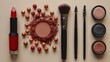 Makeup brushes and eye shadow palette, mascara, eyeliner, lipstick on beige background
