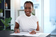 © peopleimages.com - Portrait, black woman and paperwork with pen in office for new opportunity, business deal or proposal. Female person, smile and document to sign for career, sales agent and professional in workplace