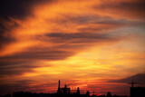 Fototapeta  - Sunset sky background panorama concept. Top view of horizon Evening sunset sky and morning sunrise in Colorful city with copy space. Empty beautiful sky, panoramic view, tropical bright twilight
