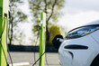 Electric car charging at electric charging station