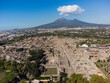 Pompei, Itay: Aerial view of the famous Pompeii archaeological old city by the Vesuve volcano in Napoly, or Naples, in Italy on a sunny day.