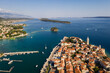Rab, Croatia: Aerial drone view of the famous Rab medieval old town by the Adriatic sea in Croatia on a sunny summer day
