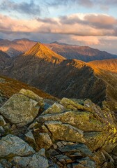 Wall Mural - Mountain landscape at dramatic sunset and sky. Alpine tourism and beautiful experiences. Western Tatra mountains or Rohace. Climbing and discover the world.