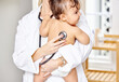 © peopleimages.com - Sick kid, pediatrician and baby with stethoscope for check up, healthcare and illness in family clinic. Child, female physician and hospital room for unwell infant, heart results and medical exam