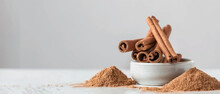 Cinnamon Sticks And Powder  Isolated On White Background