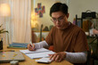 © DragonImages - High school student doing math homework
