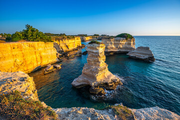 view at dawn of the Faraglioni of S. Andrea, Melendugno, Lecce, Puglia