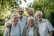 © Chacmool - Portrait of happy senior family standing in the garden and looking at camera