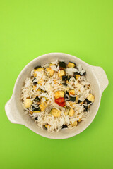 Wall Mural - Boiled rice with vegetables in small bowl