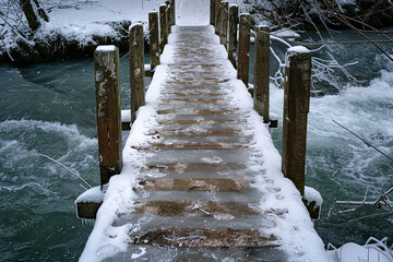 Wall Mural - An icy bridge over a river becomes slick and hazardous during a cold snap - posing a danger to unwary travelers