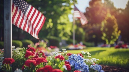 patriotic display of american flags and flowers in park