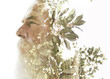 A serene double exposure profile of an old bearded man