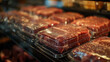 Packaged meat in a supermarket fridge.
