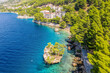 Punta Rata beach in Brela, Croatia, aerial view. Adriatic Sea with turquoise clean water and white sand on the beach.