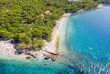 Fototapeta  - Punta Rata beach in Brela, Croatia, aerial view. Adriatic Sea with turquoise clean water and white sand on the beach.