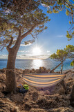 Fototapeta Big Ben - Hammock net installed on Punta Rata beach in Brela, Croatia, Dalmatia, Croatian azure coast.