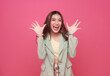 Young Asia girl feel happiness with positive expression, joyful surprise laugh isolated on pink background.